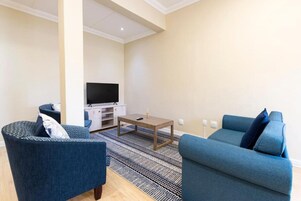 54-inch flat-screen TV with satellite channels