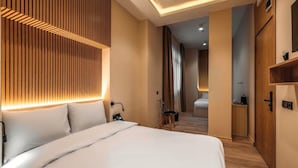 Economy Triple Room | Blackout drapes, iron/ironing board (on request), WiFi (free) - LAHORE TBILISI HOTEL (Tbilisi)