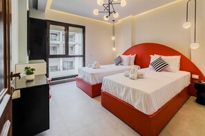 2 habitaciones, tabla de planchar con plancha y ropa de cama