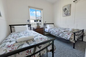 2 habitaciones, tabla de planchar con plancha y wifi gratis 