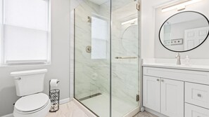 Shower, hair dryer, towels