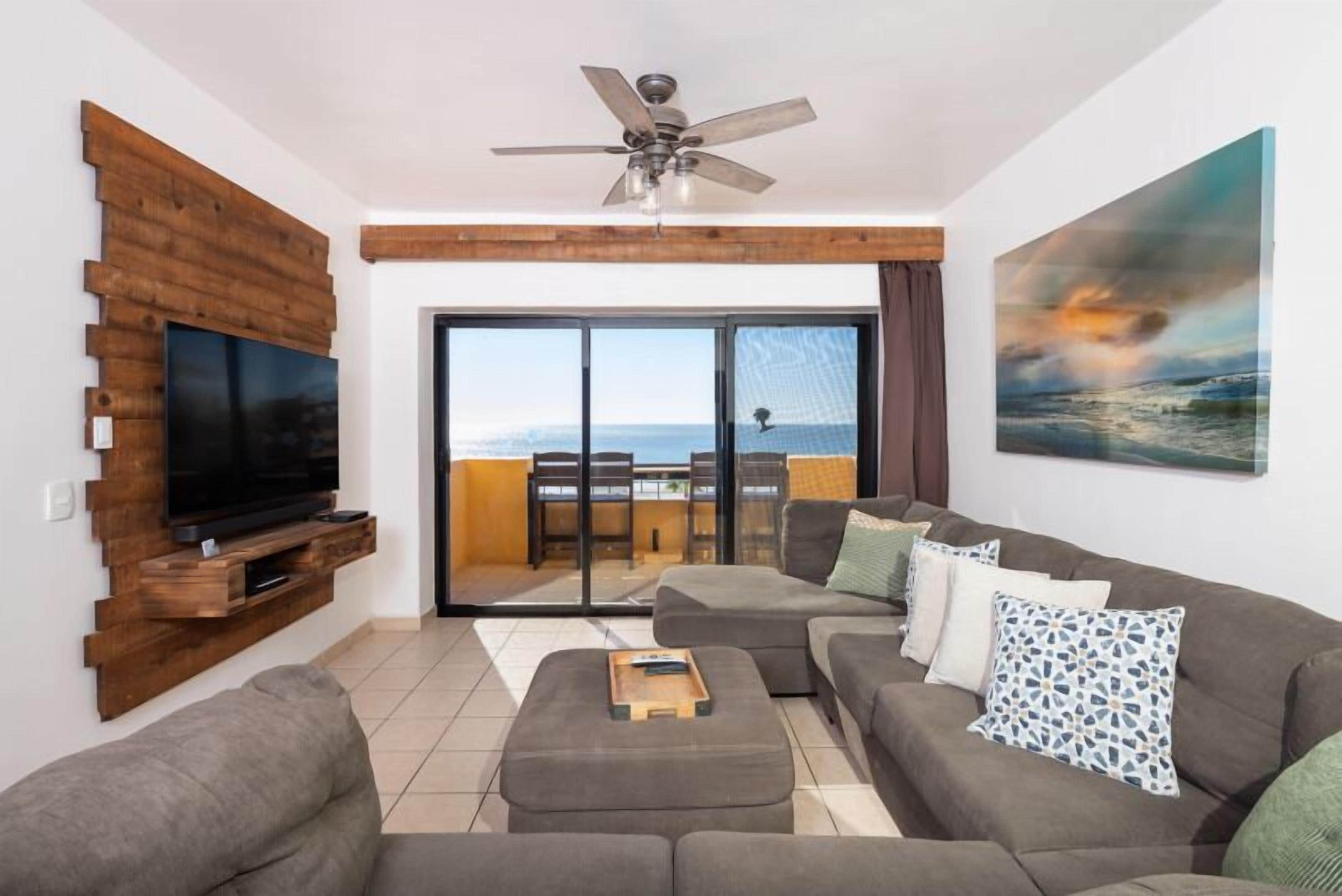 Penthouse, 1 Bedroom, Ocean View, Beachfront | Living area | 52-inch Smart TV with satellite channels, Netflix, streaming services