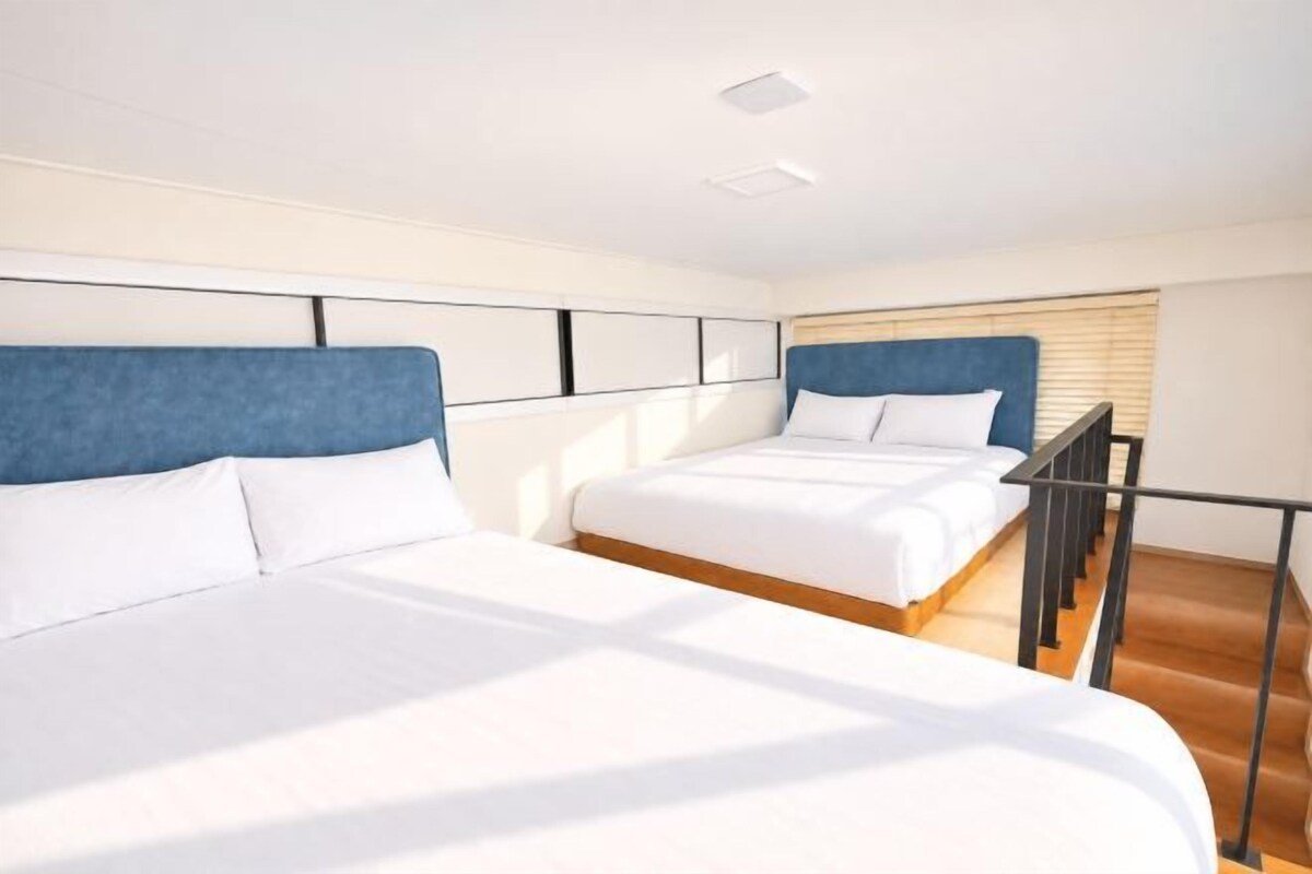Blackout drapes, soundproofing, iron/ironing board (on request)