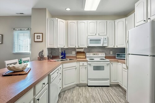 First Floor Condo in the Summerlyn with Community Pool