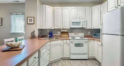 First Floor Condo in the Summerlyn with Community Pool