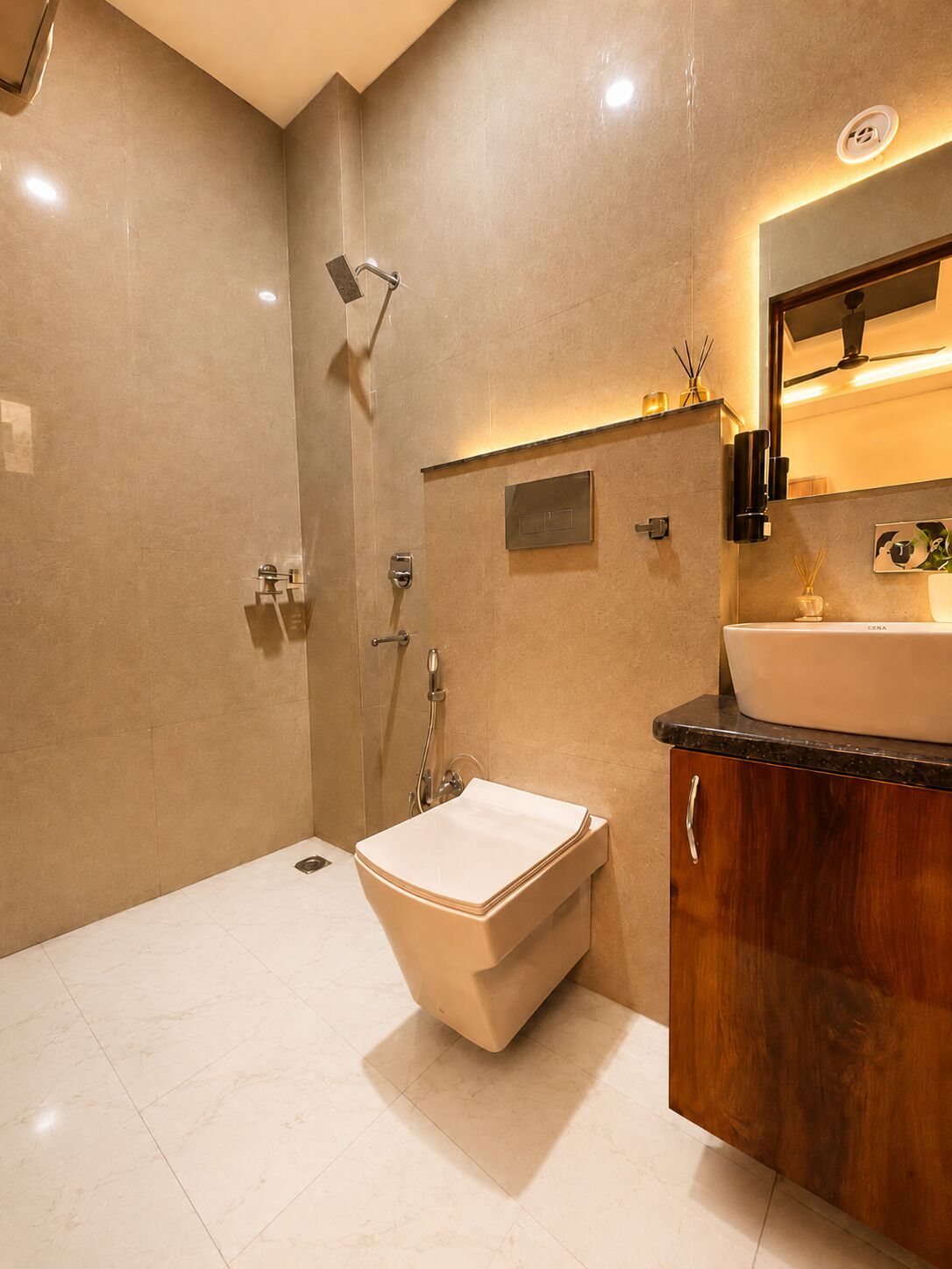 A modern bathroom with a freestanding bathtub, a vanity with a sink, and a shower area.