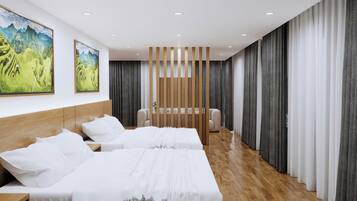 Habitación de hotel moderna con dos camas, cabecero de madera, un cuadro grande y vistas a las montañas.