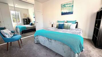 2 bedrooms, desk, iron/ironing board, travel cot