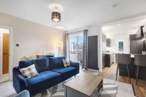 Apartment | Living area | 30-inch TV with digital channels