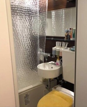 Shower, towels, soap, toilet paper