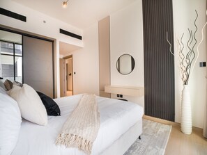 Apartment, 1 Bedroom, Pool Access | 1 bedroom, bed sheets - EasyGo Stylish 1BDR BinEmrd JVC (Dubai)