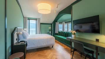 Deluxe Double Room, Terrace, Lake View | Minibar, in-room safe, desk, blackout drapes