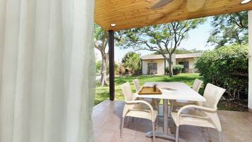 Junior Double or Twin Room, Garden View | Terrace/patio