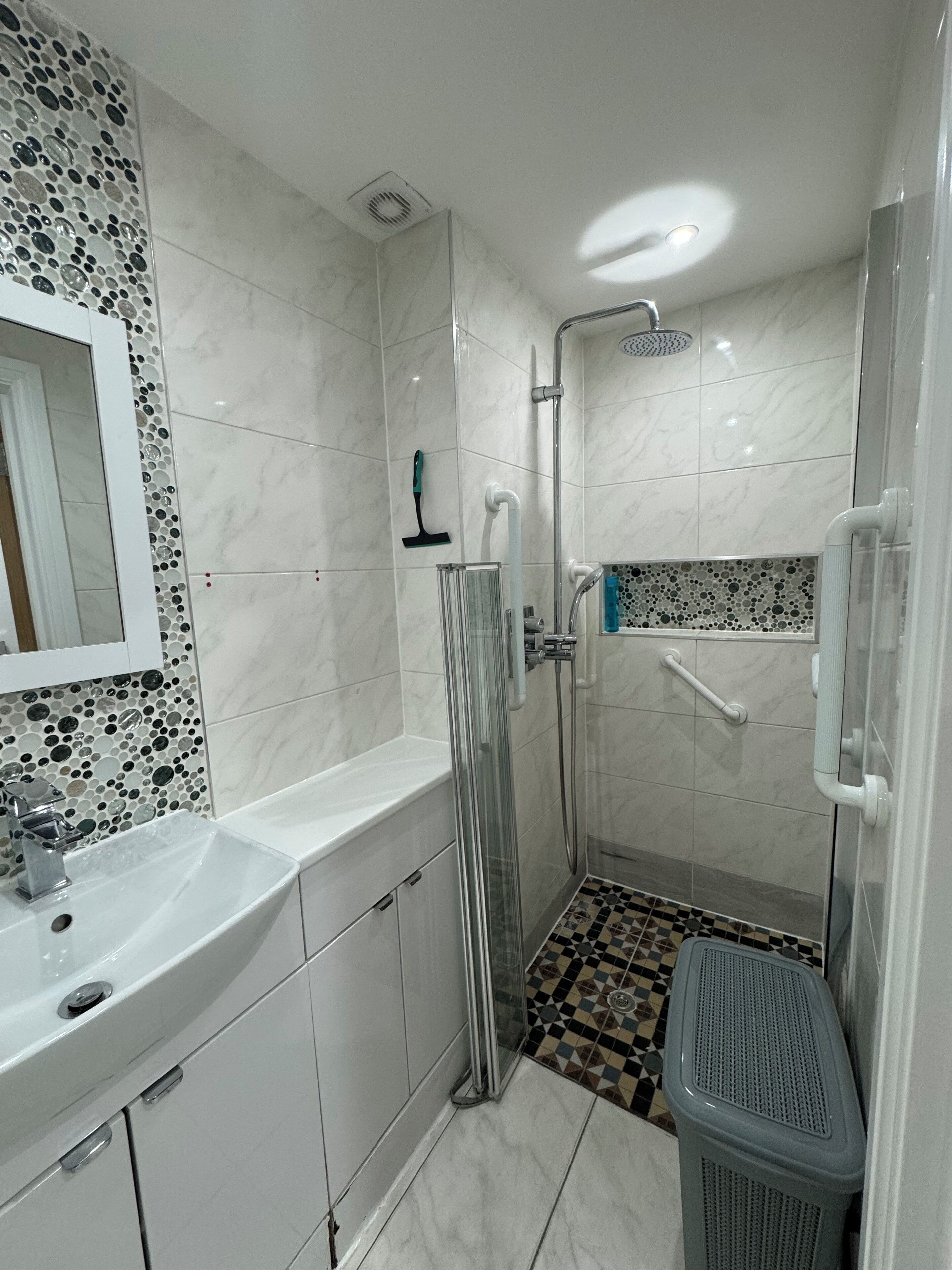 Shower, towels, toilet paper