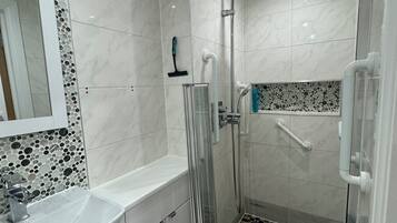 Shower, towels, toilet paper