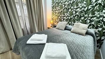 1 slaapkamer, een strijkplank/strijkijzer, wifi, beddengoed