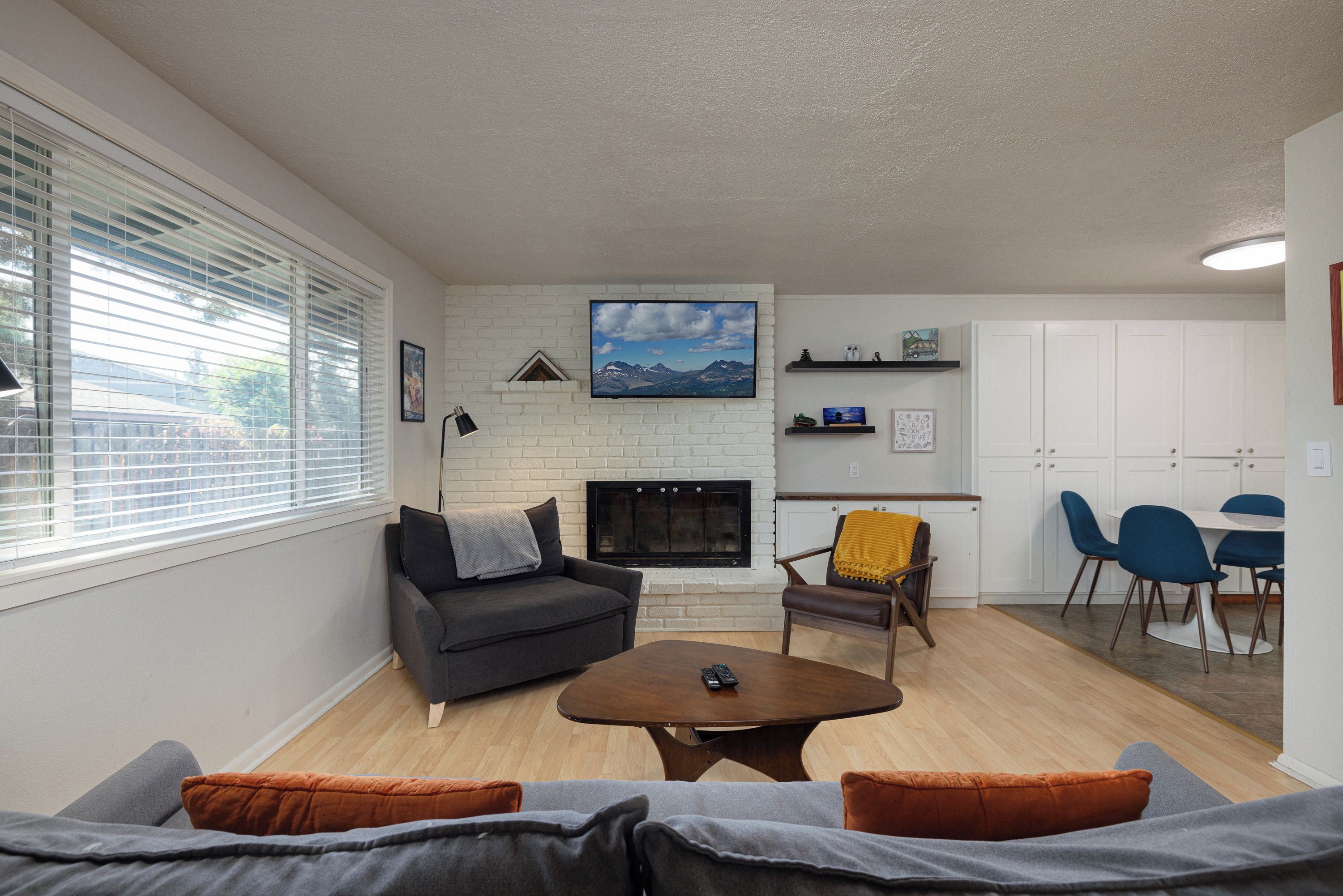 Cozy living space with Smart TV and fireplace
