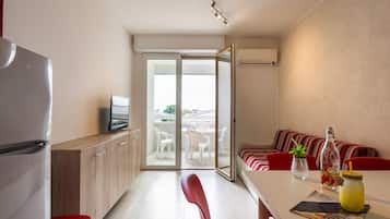 Appartement, 1 chambre, balcon | Salle de séjour
