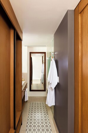 Shower, hair dryer, slippers, towels