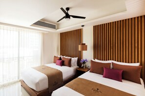 Standard Room, 2 Queen Beds, Balcony, City View | In-room safe, desk, laptop workspace, blackout drapes