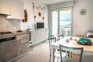 Apartment, 1 Bedroom, Balcony, Ocean View | Dining room - Seaside Retreat With Terrace in Bibione (San Michele al Tagliamento)