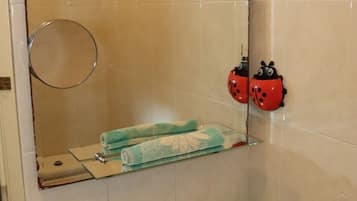Hair dryer, towels, soap, toilet paper