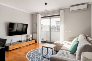 Apartamento família, 2 quartos, para não fumantes, sacada | Sala de estar