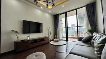 Deluxe appartement, 3 slaapkamers, uitzicht op de stad | Woonruimte