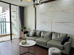 Deluxe Apartment, 3 Bedrooms, City View | Living area - Vinhomes Skylake - Liliving Service APT (Hanoi)