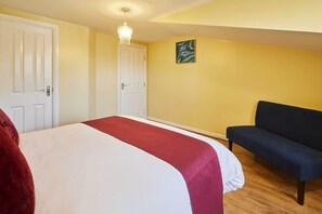 1 bedroom, desk, iron/ironing board, travel crib