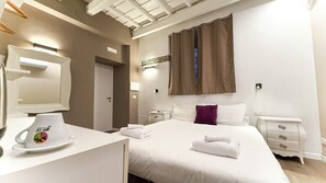 Kamar Double atau Twin Klasik | Brankas, kedap suara, setrika/meja setrika, dan Wi-Fi gratis