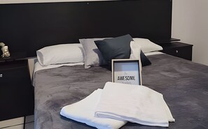 เบสิกอพาร์ทเมนท์ | Wi-Fi ฟรี, ผ้าปูที่นอน