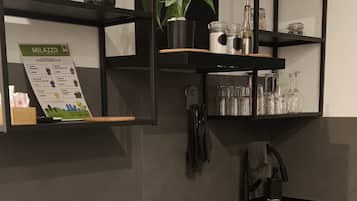 Fridge, cookware/dishes/utensils, dining tables