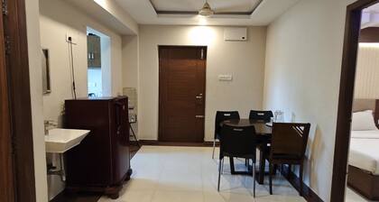 Cozy 2-bedroom apartment with AC,Furnished Living space & Fully Equipped Kitchen