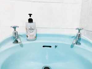 Hair dryer, towels, soap, toilet paper