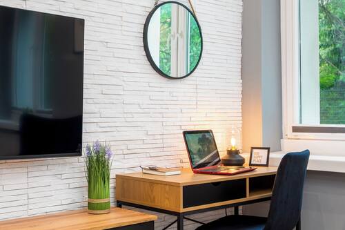 Comfort Studio, City View | Living area | 50-inch Smart TV with cable channels, Netflix, streaming services