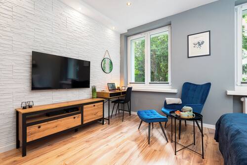 Comfort Studio, City View | Living area | 50-inch Smart TV with cable channels, Netflix, streaming services