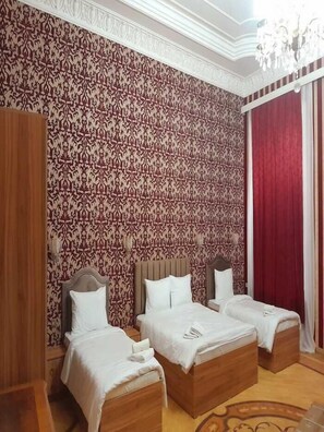 Chambre Quadruple Confort | Wi-Fi gratuit