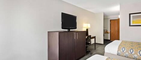 Enjoy a simple, calming room with practical storage and desk.