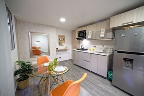 Microwave, coffee/tea maker, cookware/dishes/utensils