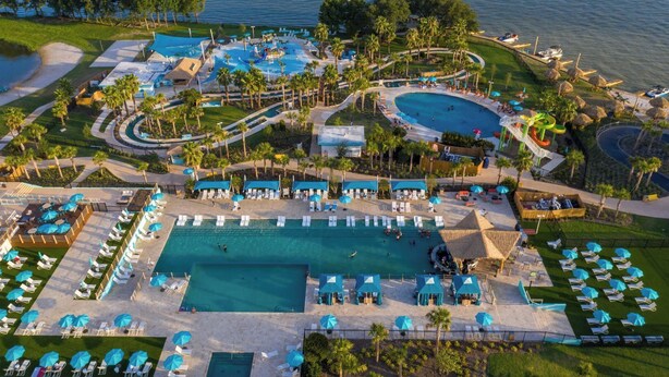 Pool - Cozy 2-bedroom condo on the water, with community pool and fitness center. (Montgomery)