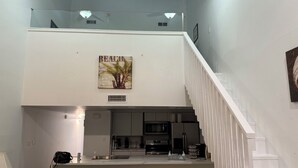 Interior - Cozy 2-bedroom condo on the water, with community pool and fitness center. (Montgomery)