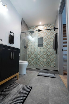 Shower, eco-friendly toiletries, hair dryer, towels
