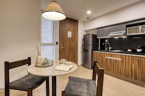 Classic Apartment | Private kitchen | Full-size fridge, microwave, coffee/tea maker, cookware/dishes/utensils