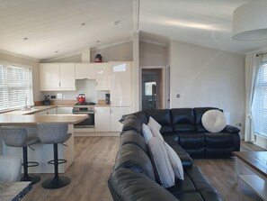 Cabin | Living area - 2-bed Lodge, Sleeps 5 w/ Hot Tub & Lake View (Beverley)
