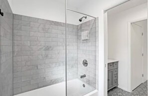 Shower, jetted tub, hair dryer, towels