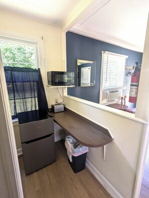 Fridge, microwave, stovetop, coffee/tea maker
