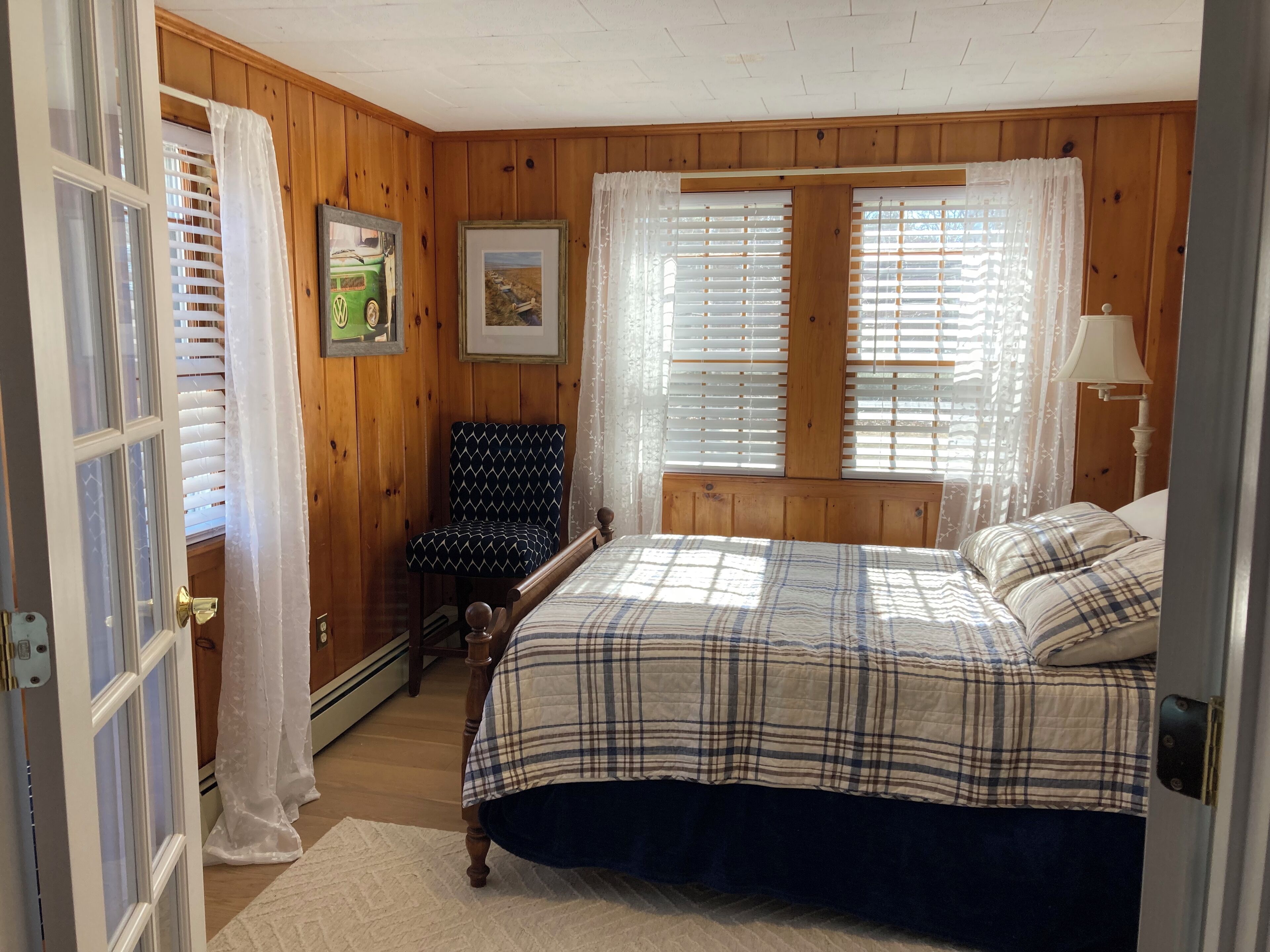 Third bedroom with queen bed and french doors