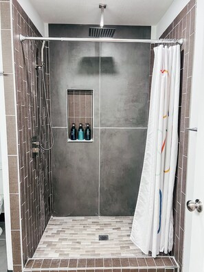 Hair dryer, towels, soap, shampoo