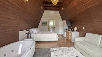 Quarto duplo superluxo, vista para a lagoa | Comodidades do quarto